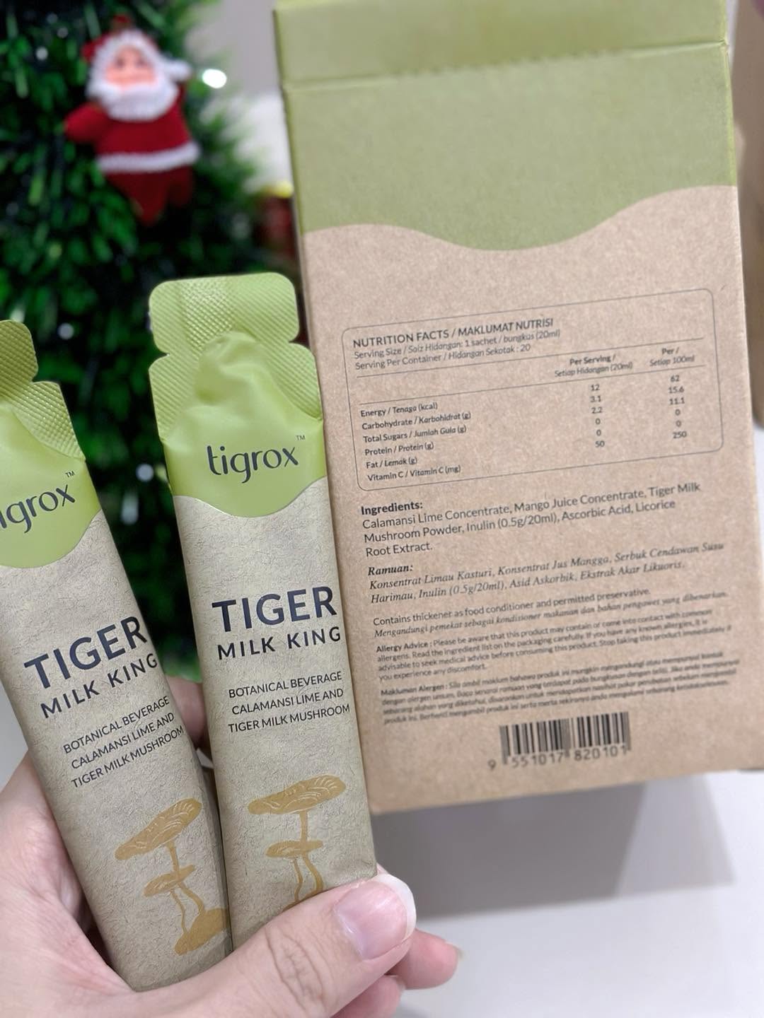 Tiger Milk King sachets beside the back of the box showing nutrition facts and ingredients