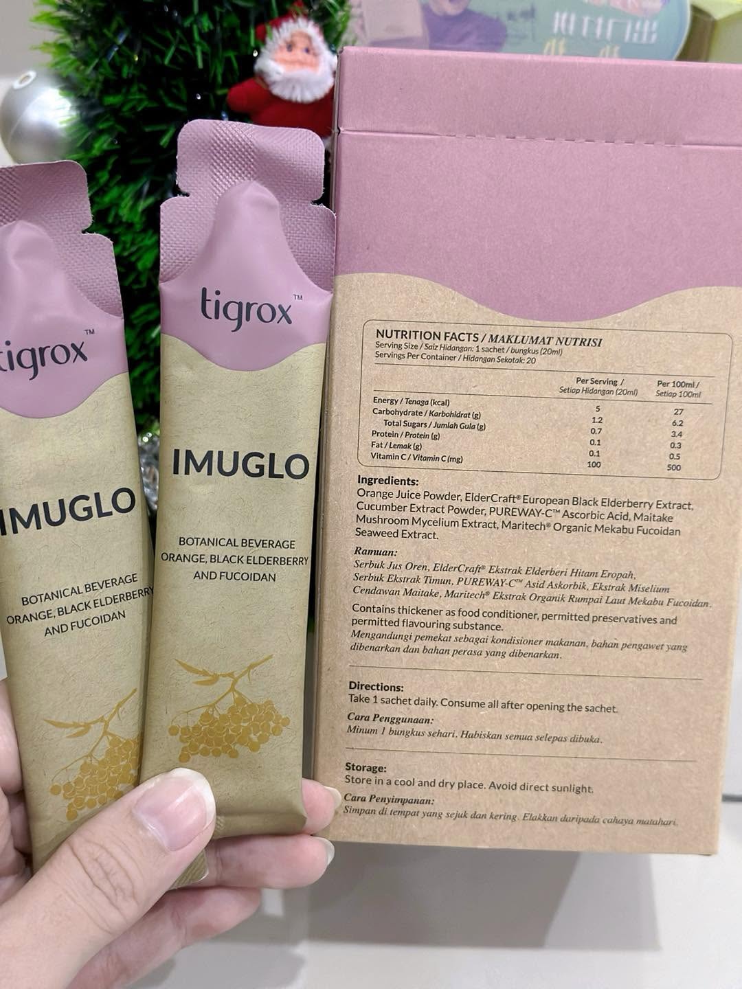 IMUGLO sachets beside the back of the box showing nutrition facts and ingredients